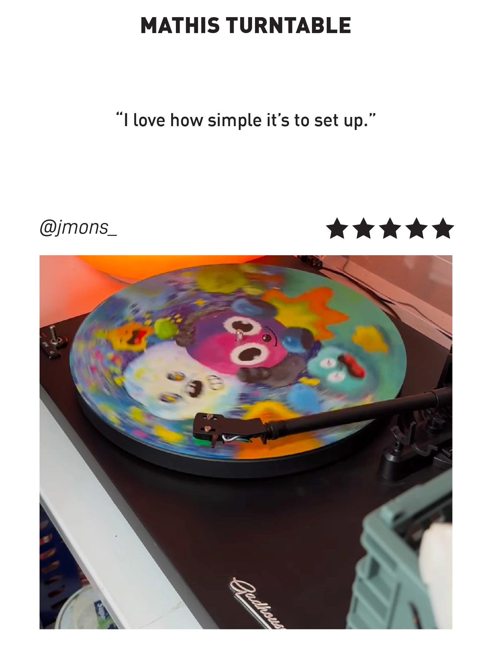 Gadhouse Mathis Turntable playing a colorful illustrated vinyl record, praised for its simple setup by @jmons_