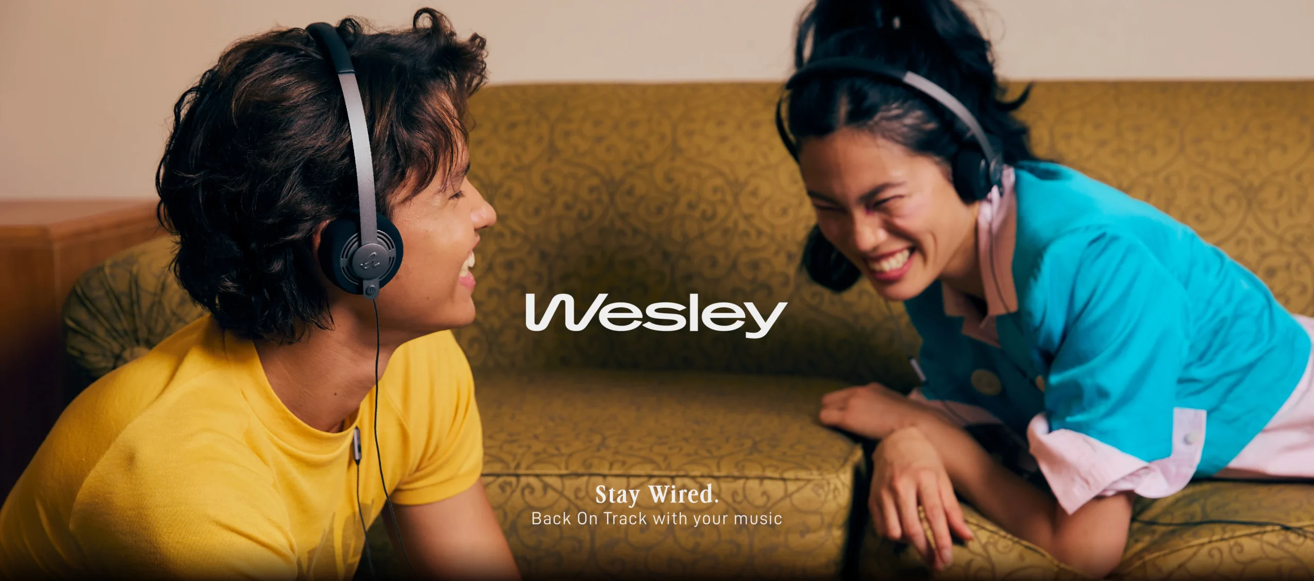 Banner Wesley Headphones On Desktop